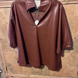 Emily McCarthy Brown Faux Leather Blouse
Beautiful soft faux leather